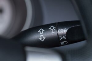 close up of the turning signal controls in a modern car