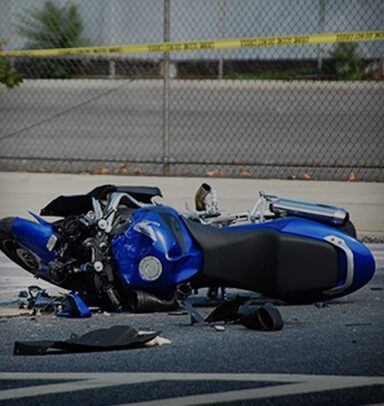 Motorcycle on side of road after accident