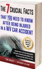 Book cover for "The 7 Crucial Facts" by Tim Miley, featuring a car window with cracks and legal advice for car accident injuries in West Virginia.