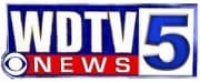 WDTV News 5 logo with a blue and white color scheme, featuring "WDTV" in bold letters and "NEWS" on a red background, with a small CBS logo at the bottom left.